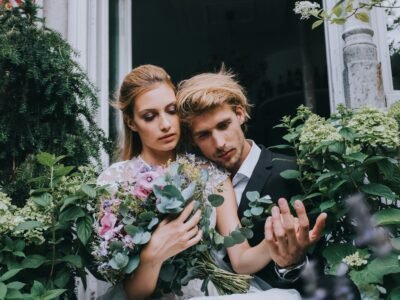 Couple Hand in Hand with Flowers